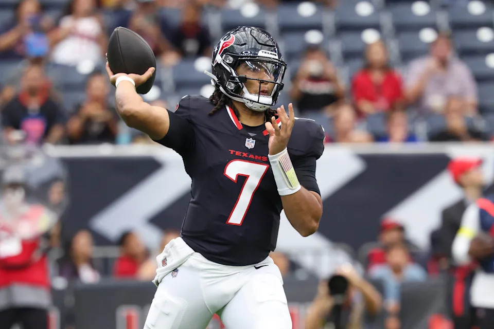 Aug 16, 2025; Houston, Texas, USA; Houston Texans quarterback C.J. Stroud (7) attempts a pass during the first quarter against the Carolina Panthers at NRG Stadium. Mandatory Credit: Troy Taormina-Imagn Images