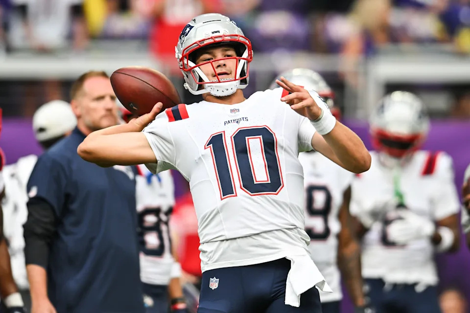 Aug 16, 2025; Minneapolis, Minnesota, USA; New England Patriots quarterback Drake Maye (10) warms up before the game against the Minnesota Vikings at U.S. Bank Stadium. Mandatory Credit: Jeffrey Becker-Imagn Images