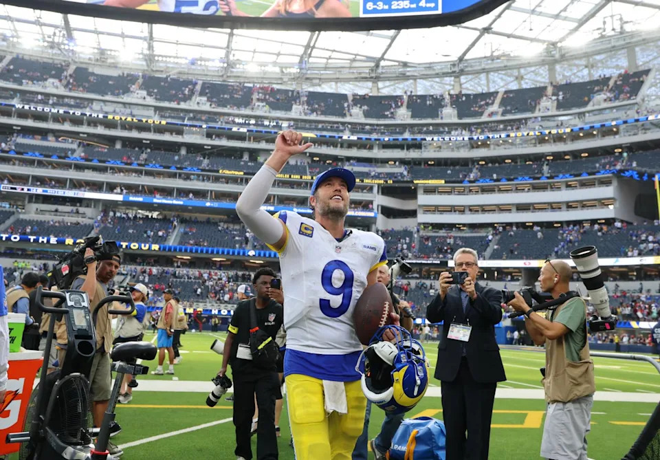Rams quarterback Matthew Stafford celebrates as he walks off the field at SoFi Stadium.