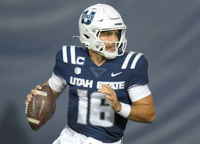 Utah State quarterback Bryson Barnes (16) looks to throw the ball against Air Force in the first half Saturday Sept. 13, 2025, in Logan, Utah. | Eli Lucero/Herald Journal