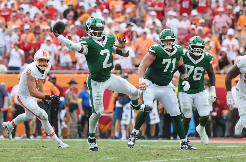 Sep 21, 2025; Tampa, Florida, USA; New York Jets quarterback Tyrod Taylor (2) throws the ball for a touchdown against the Tampa Bay Buccaneers during the second half at Raymond James Stadium. Mandatory Credit: Kim Klement Neitzel-Imagn Images