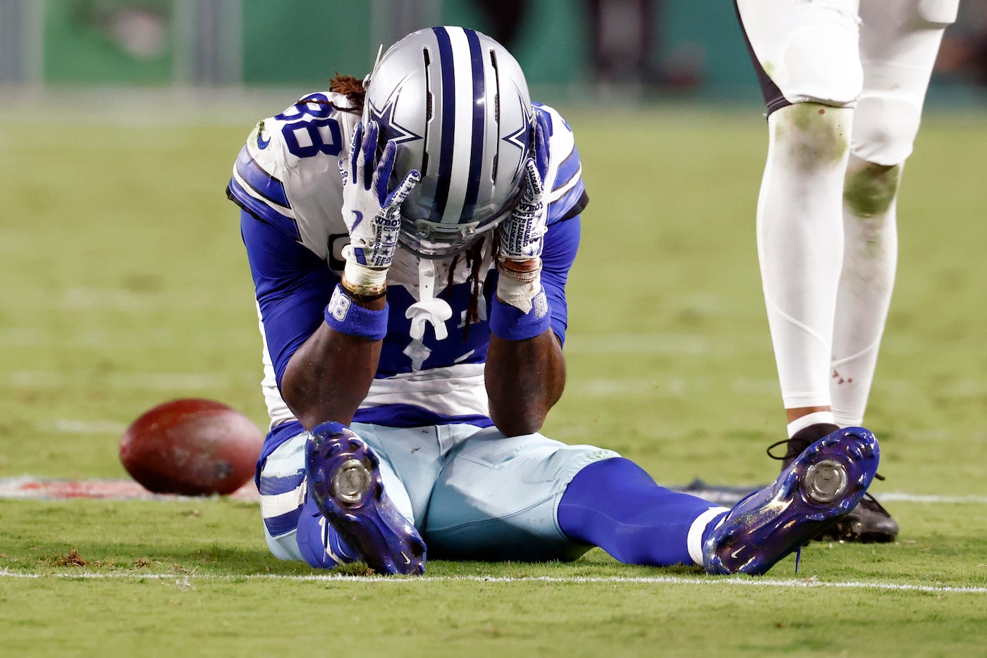 Dallas Cowboys wide receiver CeeDee Lamb (88) reacts after dropping a catch on fourth down...