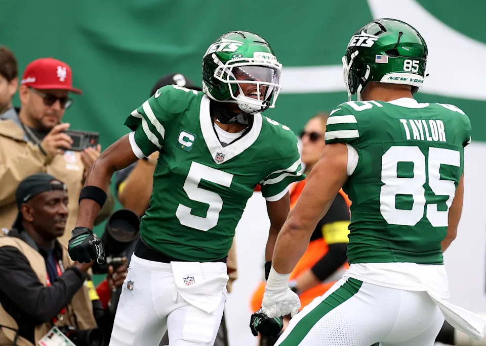 EAST RUTHERFORD, NEW JERSEY - SEPTEMBER 07: Garrett Wilson #5 and Mason Taylor #85 of the New York Jets celebrate after a touchdown in the first quarter during the game at MetLife Stadium on September 07, 2025 in East Rutherford, New Jersey. (Photo by Evan Bernstein/Getty Images)