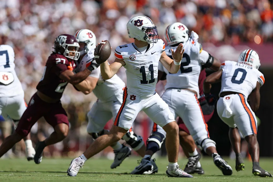 Sep 27, 2025; College Station, Texas, USA; Auburn Tigers quarterback Jackson Arnold (11) throws the ball during the second quarter against the Texas A&M Aggies at Kyle Field. Mandatory Credit: Troy Taormina-Imagn Images