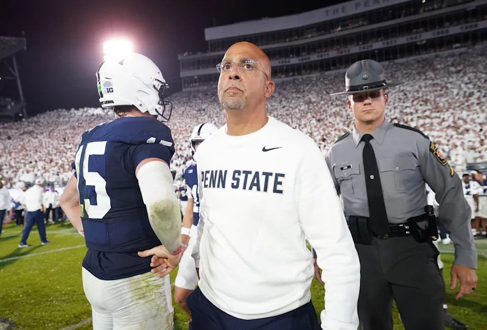 Sep 27, 2025; University Park, Pennsylvania, USA; Penn State Nittany Lions head coach James Franklin and quarterback Drew Allar (15) react after losing to the Oregon Ducks at Beaver Stadium. Mandatory Credit: James Lang-Imagn Images