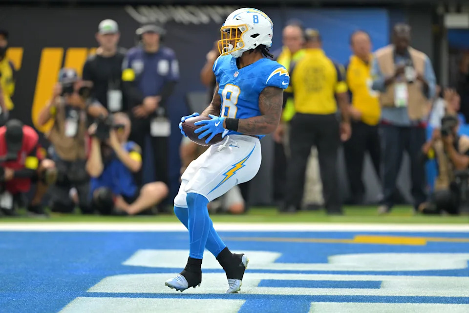 Los Angeles Chargers running back Omarion Hampton runs for a touchdown in the first half against the Denver Broncos at SoFi Stadium.
