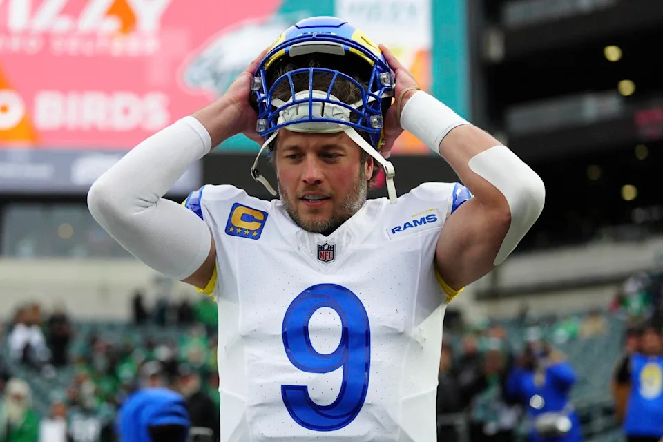 Rams quarterback Matthew Stafford puts on his helmet during the NFC divisional playoffs.