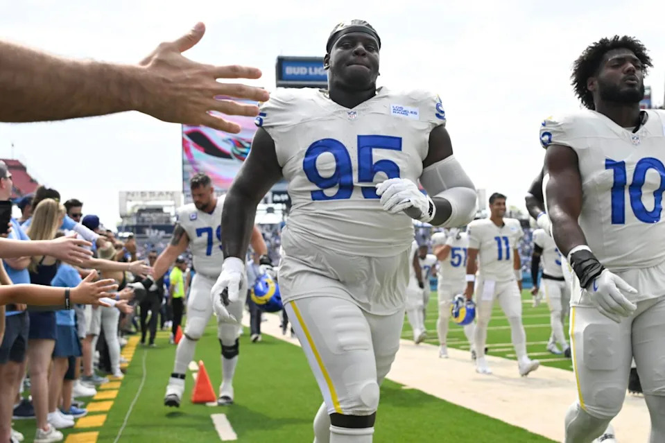 Rams defensive tackle Poona Ford runs on the field before a win over the Tennessee Titans on Sept. 14.