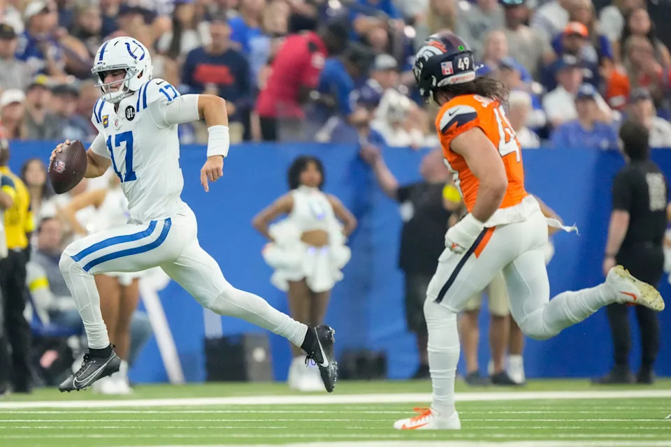 Indianapolis Colts quarterback Daniel Jones (17) rushes with the ball Sunday, Sept. 14, 2025, during a game against the Denver Broncos at Lucas Oil Stadium in Indianapolis.