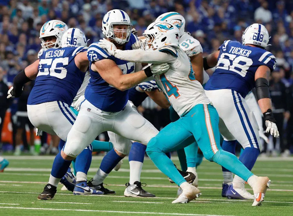 Miami Dolphins linebacker Chop Robinson (44) battles Indianapolis Colts offensive tackle Braden Smith (72) at the line of scrimmage in the second half of an NFL football game in Indianapolis, Indiana on Sunday, October 20, 2024. The same teams open the 2025 season there this Sunday.