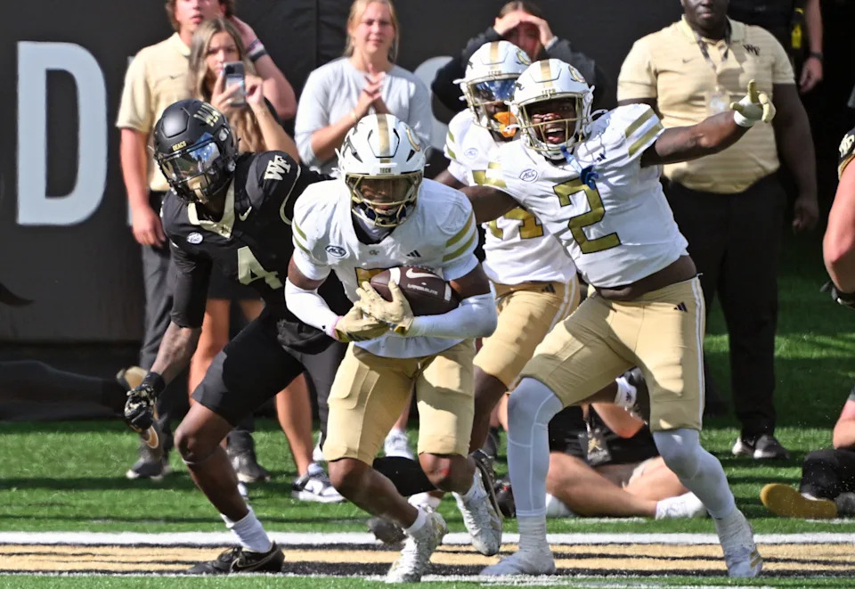 Sep 27, 2025; Winston-Salem, North Carolina, USA; Georgia Tech Yellow Jackets defensive back Clayton Powell-Lee (5) makes an interception on a two-point conversion in overtime against the Wake Forest Demon Deacons at Allegacy Federal Credit Union Stadium.