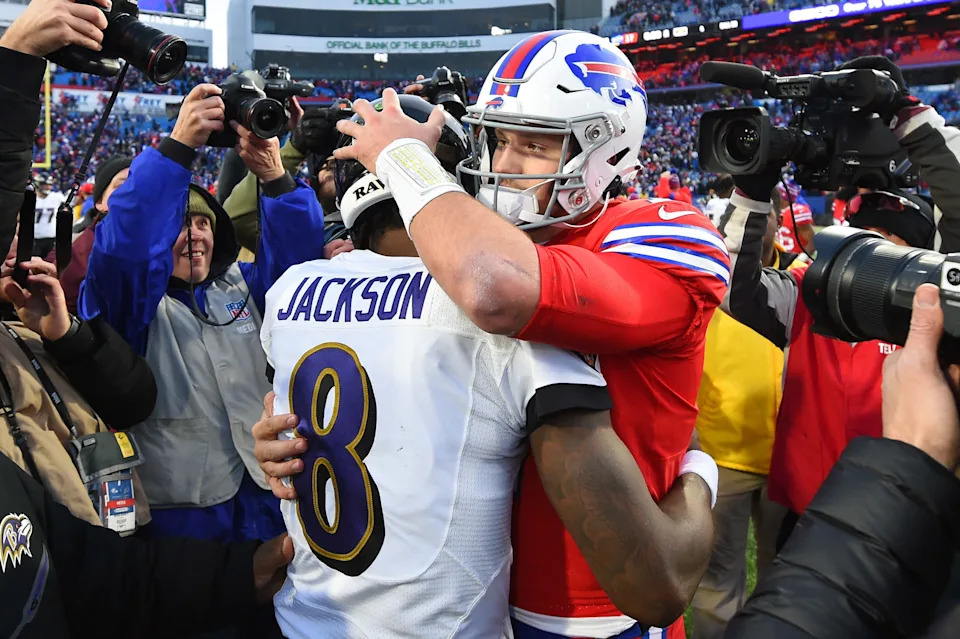Dec 8, 2019; Orchard Park, NY, USA; Baltimore Ravens quarterback Lamar Jackson (8) and Buffalo Bills quarterback Josh Allen (17) embrace following the game at New Era Field. Mandatory Credit: Rich Barnes-USA TODAY Sports