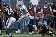 Dallas Cowboys running back Javonte Williams (33) carries the ball against Chicago Bears...