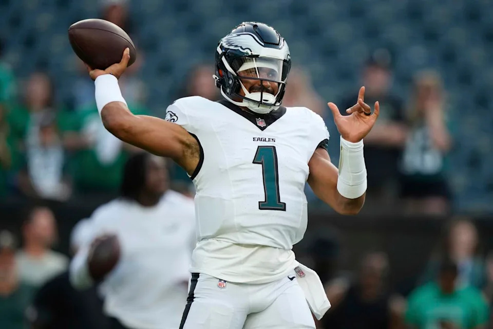 Philadelphia Eagles quarterback Jalen Hurts warms up before a preseason game.