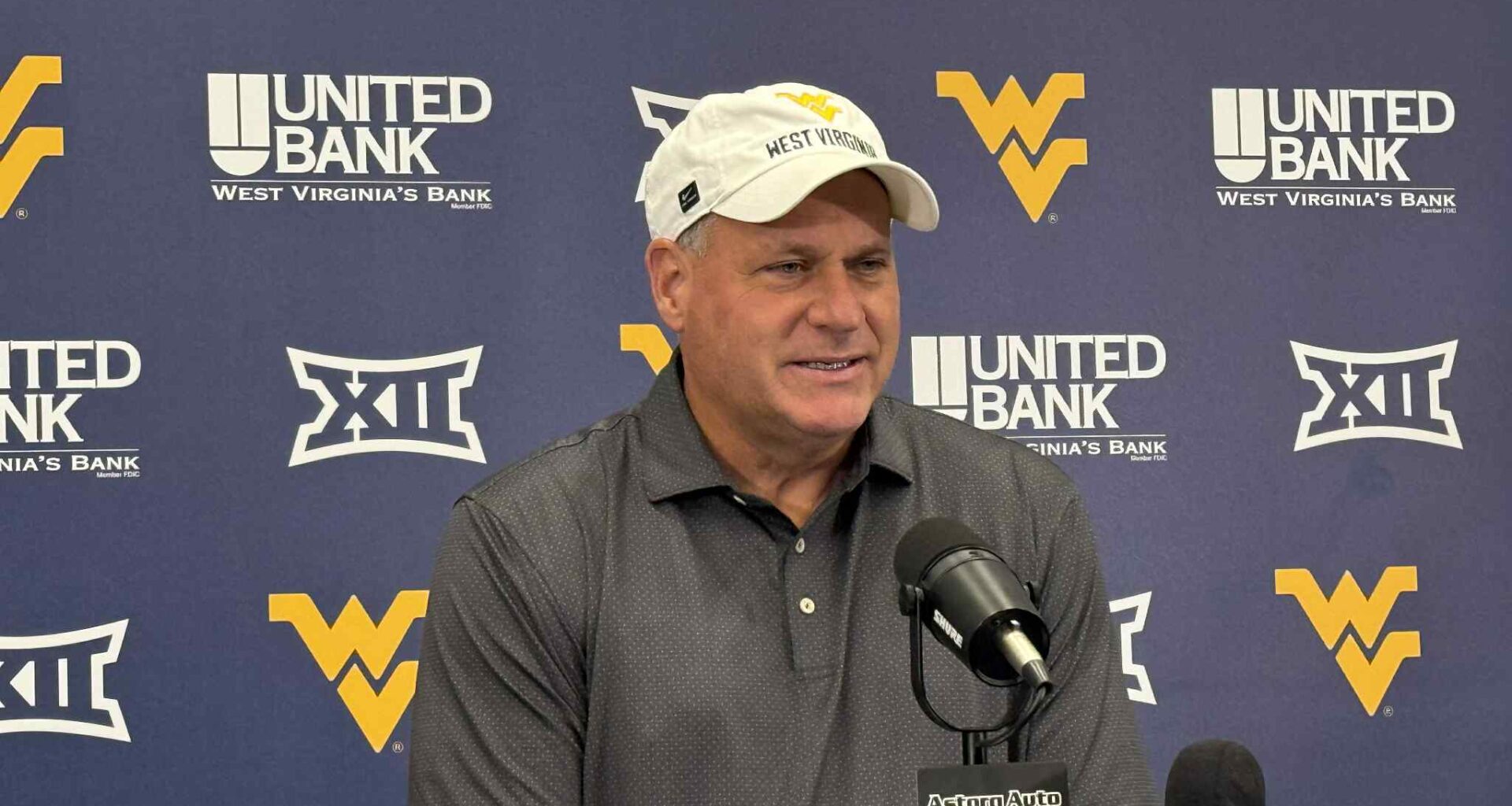 West Virginia quarterback Nicco Marchiol celebrates the touchdown against Pitt