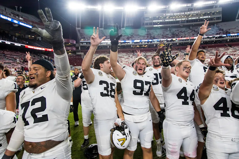 Sep 13, 2025; Columbia, South Carolina, USA; Vanderbilt Commodores players celebrate following their win over the South Carolina Gamecocks at Williams-Brice Stadium. Mandatory Credit: Jeff Blake-Imagn Images