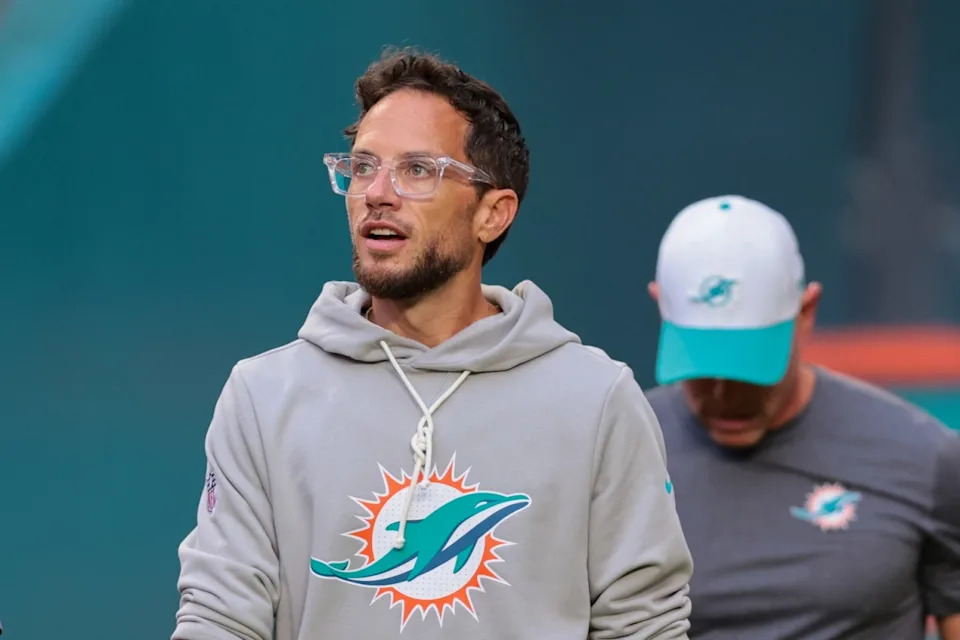 Aug 23, 2025; Miami Gardens, Florida, USA; Miami Dolphins head coach Mike McDaniel enters the field before the game against the Jacksonville Jaguars at Hard Rock Stadium. © Sam Navarro-Imagn Images