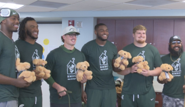 Michigan State football captains visit patients at the Mott Children’s Hospital