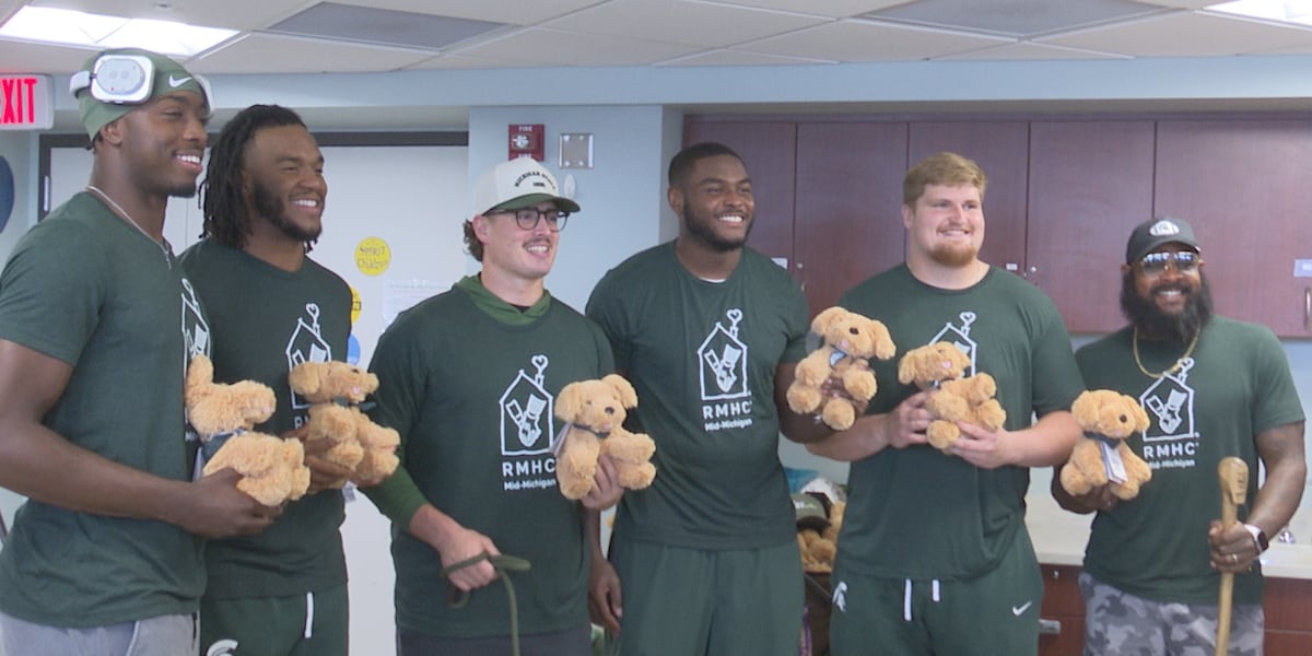Michigan State football captains visit patients at the Mott Children’s Hospital