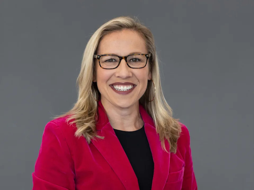 Oct 2, 2023; Camden, NJ, USA; Philadelphia 76ers play by play announcer Kate Scott poses for a photo during media day at Philadelphia 76ers Training Complex. Mandatory Credit: Bill Streicher-Imagn Images.