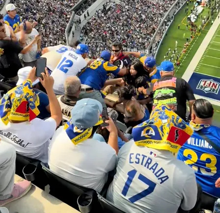 One fan was left bloodied after an all-out brawl in <br>the stands at SoFi Stadium on Sunday. @Brian.bowie43/TikTok