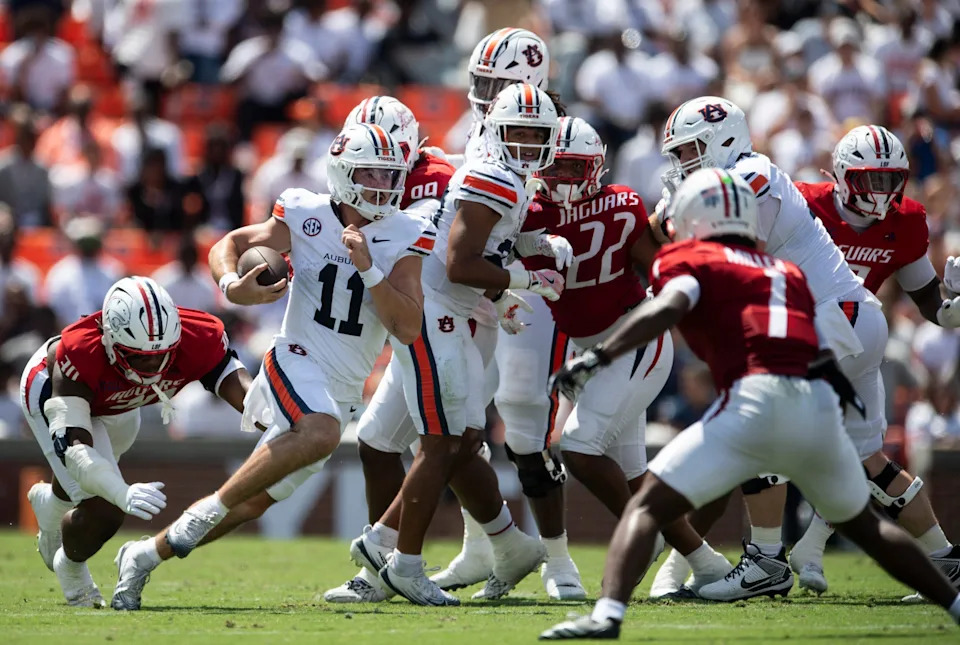 Auburn Tigers quarterback Jackson Arnold (11) runs the ball as Auburn Tigers take on South Alabama Jaguars at Jordan-Hare Stadium in Auburn, Ala. on Saturday, Sept. 13, 2025. Auburn Tigers lead South Alabama Jaguars 28-9 at halftime.