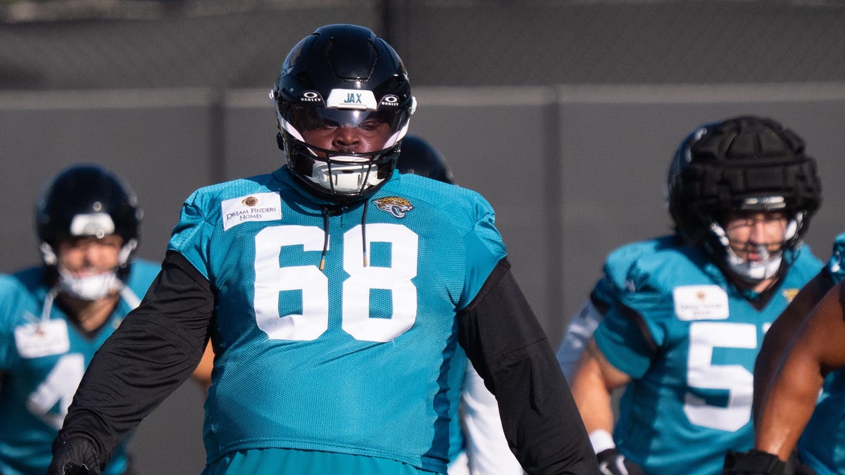 Several players change numbers after cutdowns