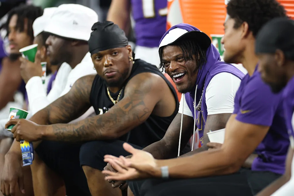 ARLINGTON, TEXAS - AUGUST 16: Lamar Jackson #8 of the Baltimore Ravens sits on the bench during the second quarter of an NFL Preseason 2025 game against the Dallas Cowboys at AT&T Stadium on August 16, 2025 in Arlington, Texas. (Photo by Stacy Revere/Getty Images)