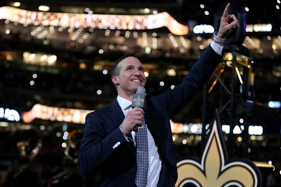 NEW ORLEANS, LOUISIANA - NOVEMBER 25: Former New Orleans Saints quarterback Drew Brees speaks to the fans during halftime of the game between the Buffalo Bills and the New Orleans Saints at Caesars Superdome on November 25, 2021 in New Orleans, Louisiana. (Photo by Chris Graythen/Getty Images)Chris Graythen&sol;Getty Images