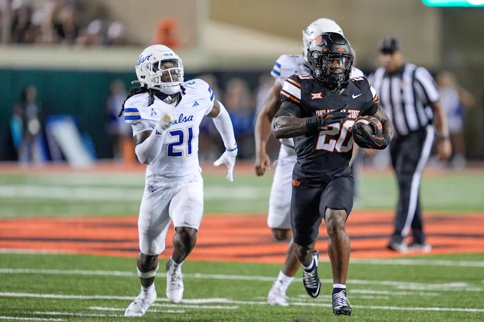 Oklahoma State running back Rodney Fields Jr. (20) runs the ball in the third quarter during an NCAA football game between Oklahoma State (OSU) and Tulsa at Boone Pickens Stadium in Stillwater, Okla., on Friday, Sept. 19, 2025.