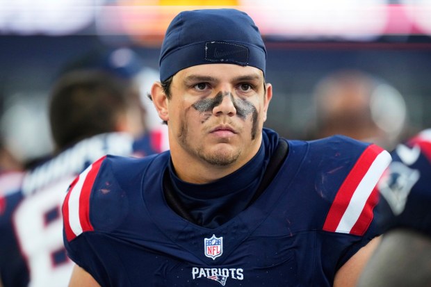New England Patriots offensive tackle Will Campbell stands on the sideline during the first half of an NFL preseason game against the Washington Commanders on Friday, Aug. 8 in Foxboro. (AP Photo/Charles Krupa)