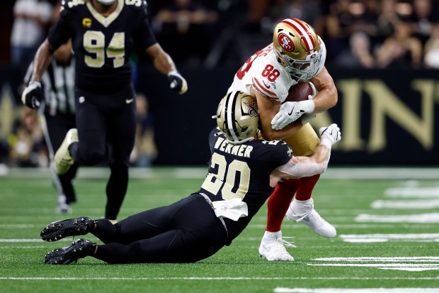 San Francisco 49ers tight end Jake Tonges (88) is tackled...