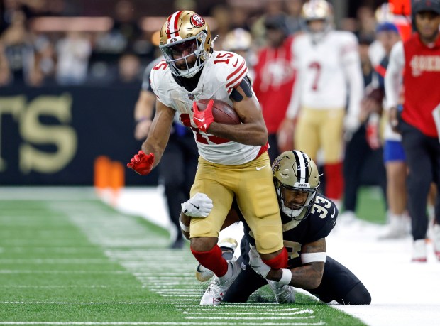 San Francisco 49ers wide receiver Jauan Jennings (15) is tackled...
