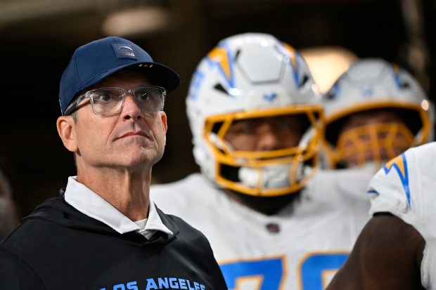Los Angeles Chargers head coach Jim Harbaugh before an NFL football game between the Las Vegas Raiders and the Los Angeles Chargers, Monday, Sept. 15, 2025, in Las Vegas. (AP Photo/David Becker)