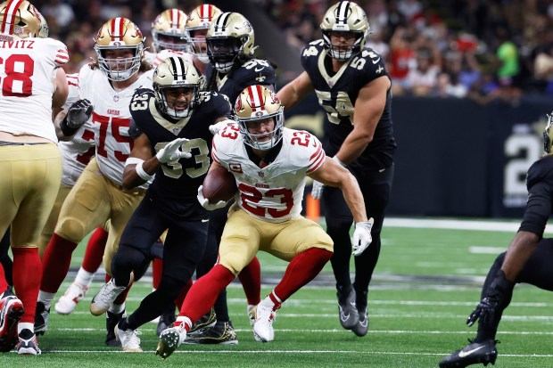 San Francisco 49ers running back Christian McCaffrey (23) runs against...
