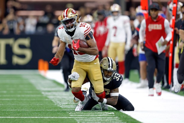 San Francisco 49ers wide receiver Jauan Jennings (15) is tackled...
