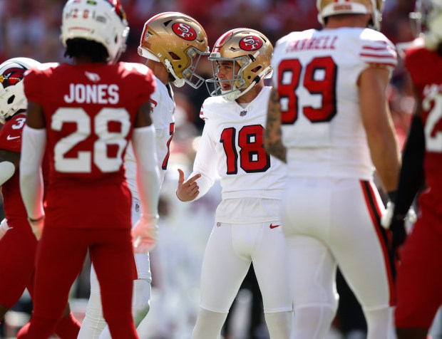San Francisco 49ers kicker Eddy Pineiro (18) celebrates his 51-yard field goal with San Francisco 49ers' Thomas Morstead (7) against the Arizona Cardinals in the second quarter at Levi's Stadium in Santa Clara, Calif., on Sunday, Sept. 21, 2025. (Nhat V. Meyer/Bay Area News Group)