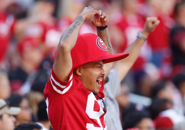 A San Francisco 49ers fan cheers for his team during the 49ers game against the Arizona Cardinals in the fourth quarter at Levi's Stadium in Santa Clara, Calif., on Sunday, Sept. 21, 2025. (Nhat V. Meyer/Bay Area News Group)