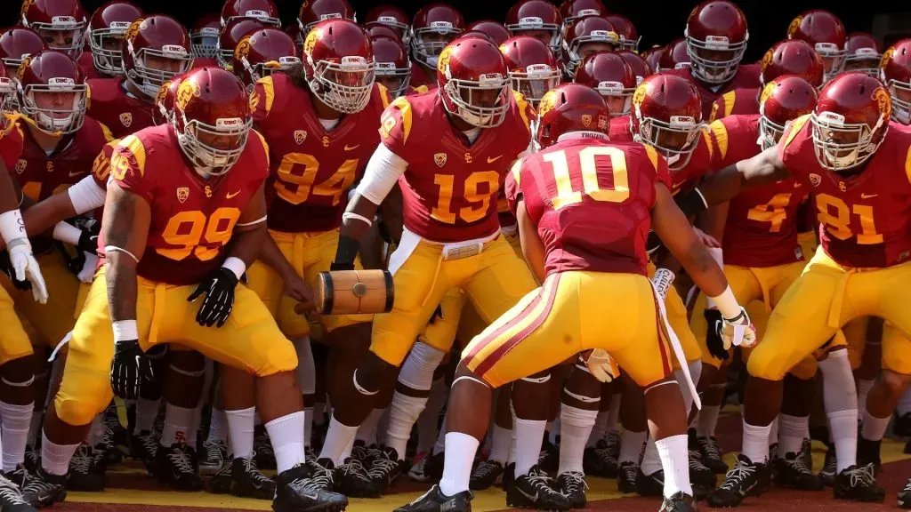 The USC Trojans get ready to run out of the tunnel for a game in 2013. (Source: Stephen Dunn/Getty Images)