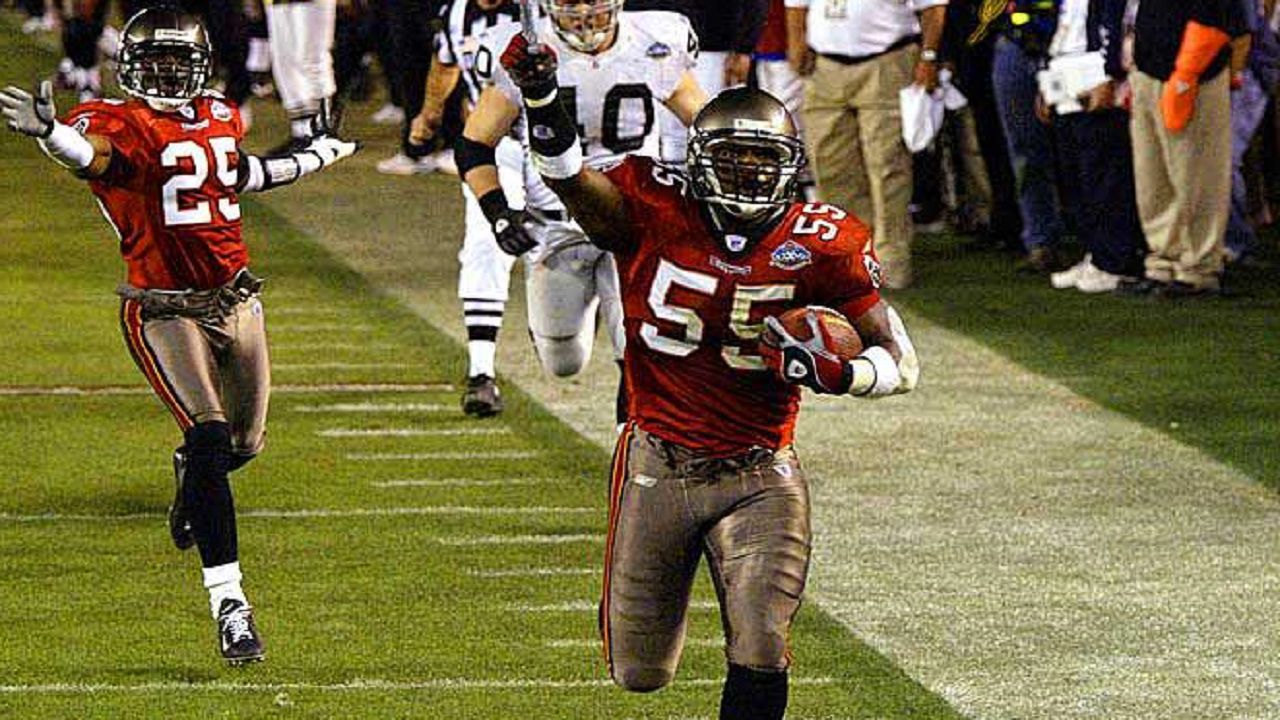 Tampa Bay Linebacker Derrick Brooks returns an interception for a touchdown during Tampa Bay's 48-21 win against Oakland in Super Bowl XXXVII in January 2003. Brooks would become Tampa Bay's second Hall of Famer at Lee Roy Selmon. (AP Image)