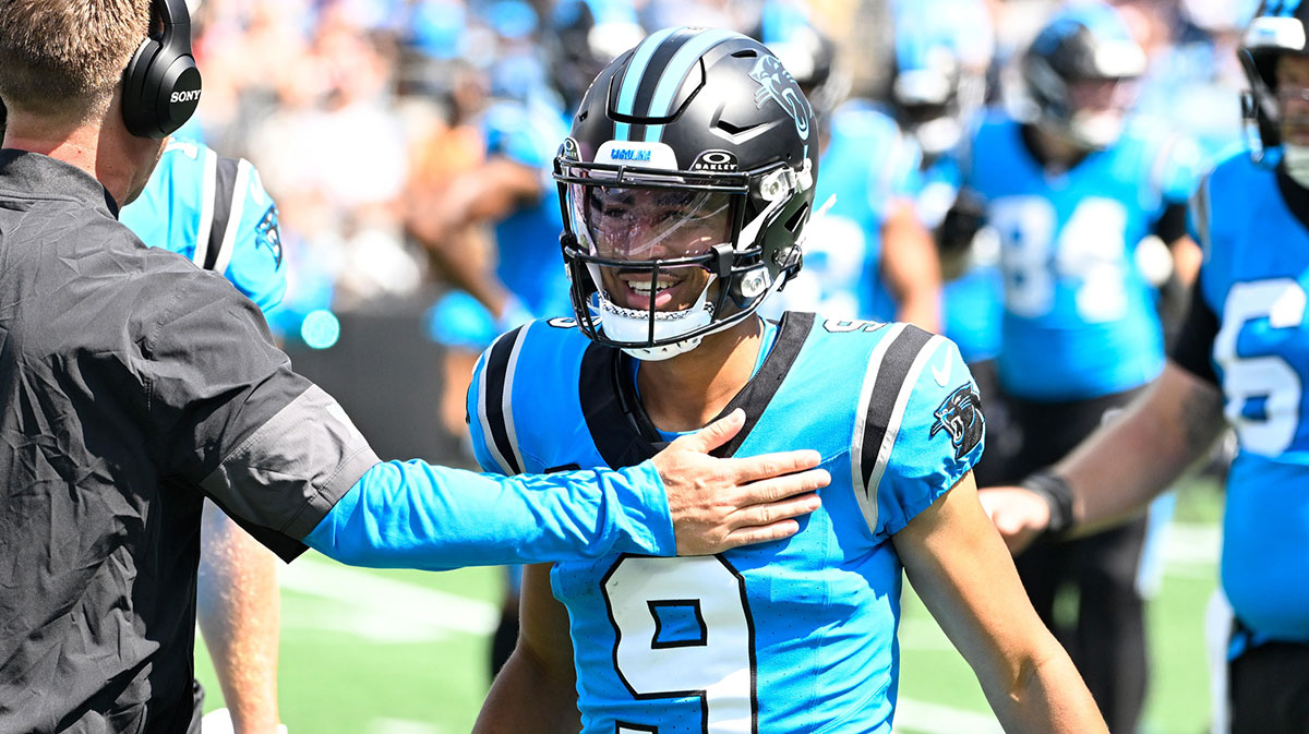 Carolina Panthers quarterback Bryce Young (9) celebrates after scoring a touchdown in the first quarter at Bank of America Stadium.