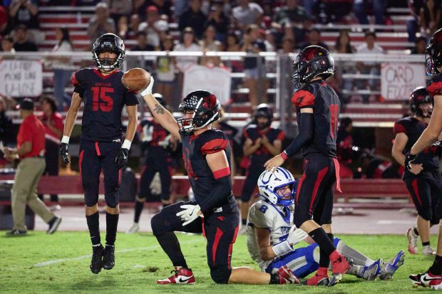 Corning High School's Ivan Jones (34) makes a catch during...