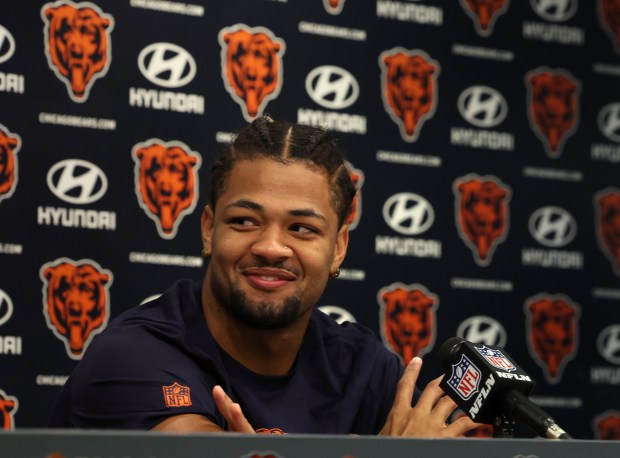 Chicago Bears wide receiver Rome Odunze speaks with the media...