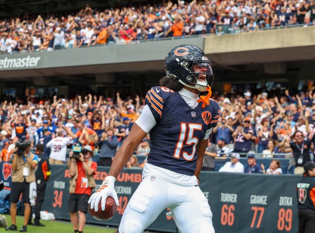 Chicago Bears wide receiver Rome Odunze (15) celebrates after a...