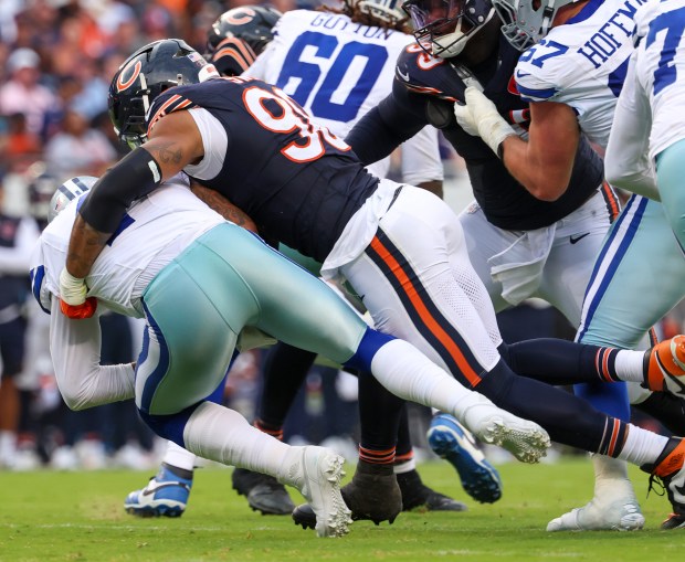 Chicago Bears defensive end Montez Sweat (98) sacks Dallas Cowboys...