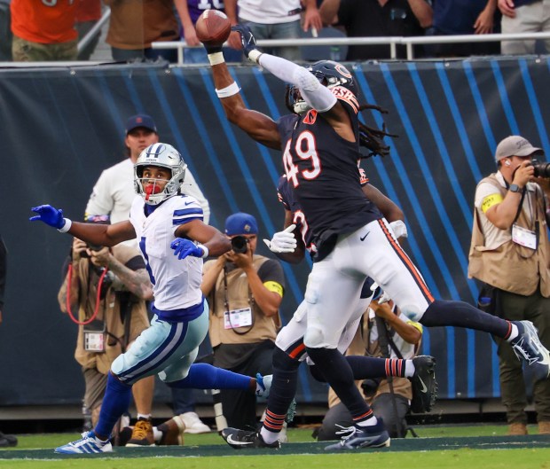 Dallas Cowboys wide receiver Jalen Tolbert (1) watches as Chicago...