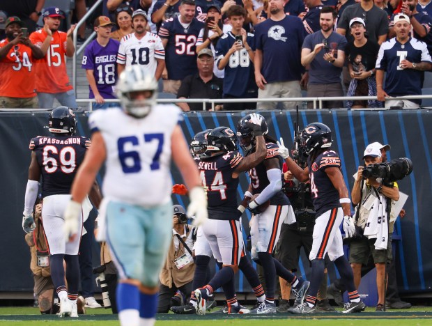 The Chicago Bears defense celebrate a second interception by linebacker...