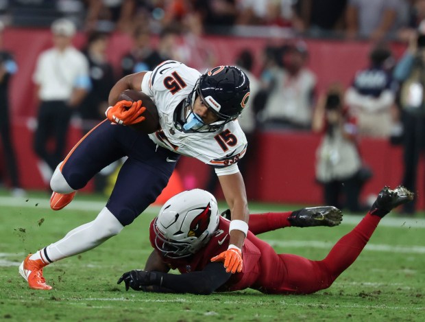 Chicago Bears wide receiver Rome Odunze (15) makes a reception...