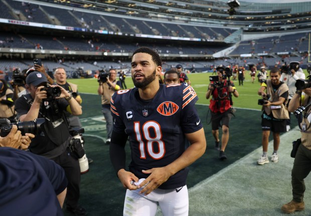 Chicago Bears quarterback Caleb Williams celebrates the win over the...