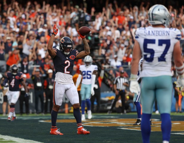 Chicago Bears wide receiver DJ Moore celebrates his touchdown against...